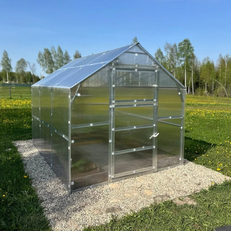 Serre La Maisonnette en polycarbonate dans un jardin - MaSerreVerte